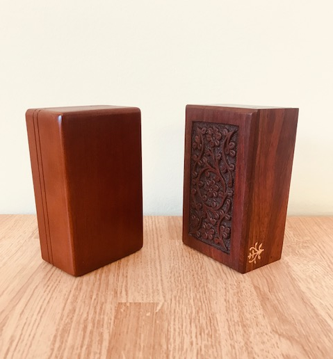 Standard wooden mahogany pet memorial urn included in price of cremation image.